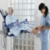 Arjo Huntleigh-hygiene-systems-shower-chairs-caregiver-with-patient-on-Carino_Product_Page_Main_Image
